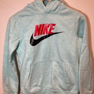 Cyan Nike hoodie.